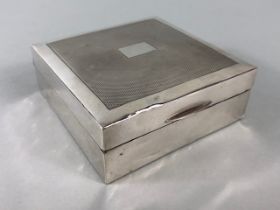 Silver English hall marked square wooden lined cigarette box of simple design approximately 8.5 x