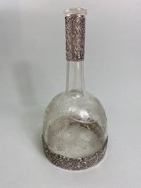 Silver marked 800 continental Glass and silver decanter, the silver repousse in an Art Nouveau style