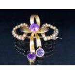 15ct yellow gold Victorian sweet heart brooch of 2 joined hearts set with seed peals and amethysts