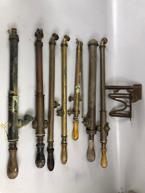 Collection of Antique and vintage brass garden sprayers, seven in total various makers and a cast
