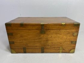 Large Campaign travelling trunk with brass bindings and corners and hinged carry handles to sides