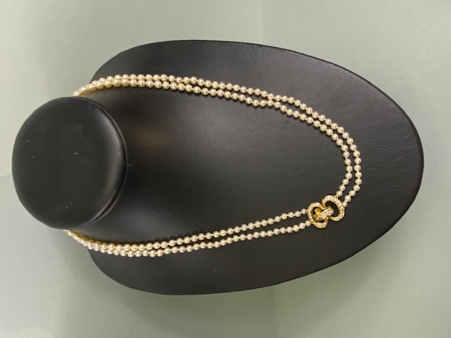 cultured pearls with 18ct gold and Diamond clasp, double strand necklace of graduated cultured