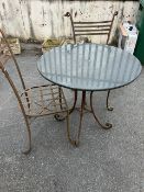 Marble topped Bistro table on wrought Iron curved legs with two wrought iron chairs