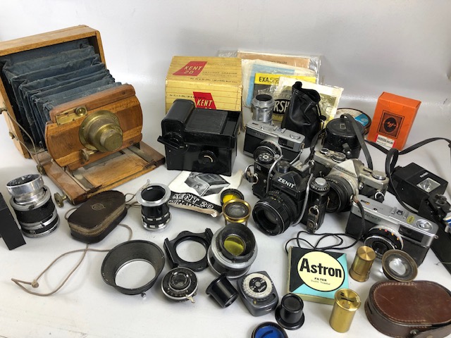 Antique and Vintage cameras and equipment wooden glass plate camera, various brass mounted lens,