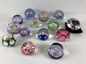 Vintage glass, collection of glass paper weights in varying designs several faceted and