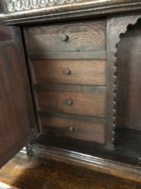 Dresser: late 19th century dark oak continental buffet cupboard, having extensive pictorial carved - Image 9 of 13