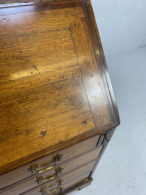 Oak Bureau with four drawers, fall front revealing pigeon holes and ornate key to lock approx 97 x - Image 10 of 14