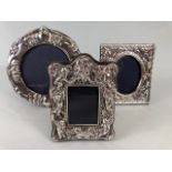 Silver hallmarked photo frames, one round of art nouveau design 14cm across, (picture 10cm), one