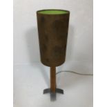 Contemporary table lamp on turned wooden and metal base with brown suede lamp shade approx 78cm tall