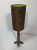 Contemporary table lamp on turned wooden and metal base with brown suede lamp shade approx 78cm tall