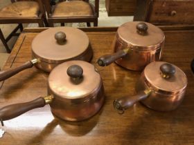 Vintage Retro mid century set of Copper pans with teak handles, comprising three sauce pans and