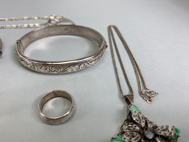 Silver hall marked jewellery and other items to include two bangles, money clip ring heart crystal - Image 7 of 9