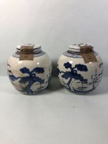 Pair of Blue and White Chinese ginger jars with paper labels, each approximately 22cm high