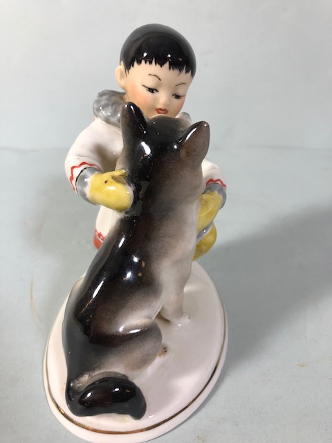 Soviet USSR Lomonosov figure of an Eskimo boy with fish, along with a boy and dog figure (damage - Image 8 of 15