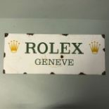 Metal an Enamel Rolex advertising sign approximately 58 x 23cm