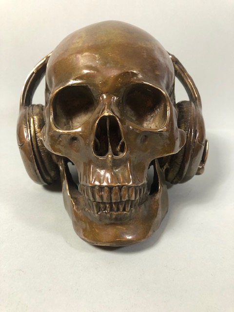 Brass Human Skull wearing headphones patinated finish approximately 14cm high