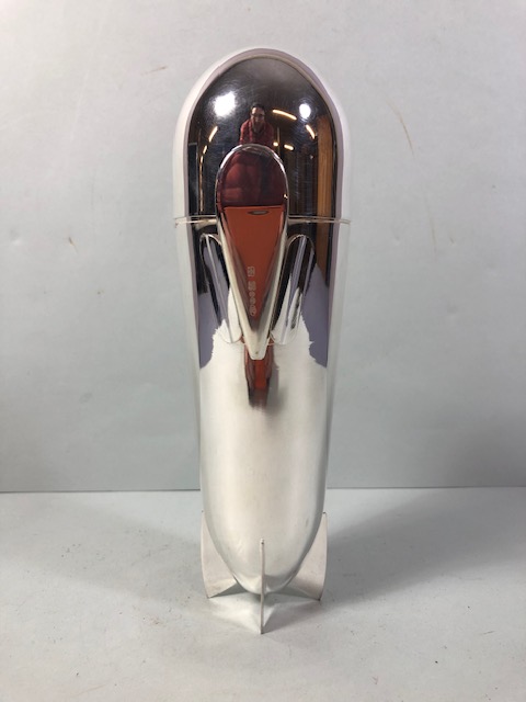 Cocktail shaker of white metal in the shape of a Zeppelin