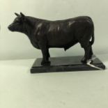 Patinated Bronze statue of a Bull on marble base approximately 18cm high