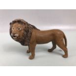 Bronze lion with cold painted finish approximately 8cm