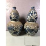 Pair of Large Blue and White Chinese double gourde vases with fish design each approximately 67cm