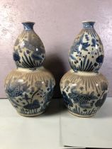 Pair of Large Blue and White Chinese double gourde vases with fish design each approximately 67cm