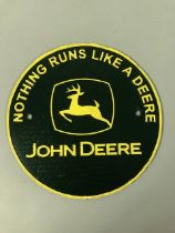 Cast Iron advertising sign John Deer approximately 24cm across