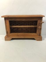 Wooden egg box or cupboard with wire mesh front approximately 38 x 12 x 25 cm