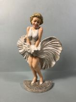 Marilyn Monroe painted cast Iron figure of her wearing the famous white dress approximately 34cm