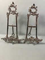 Pair of white metal table top easels each approximately 39cm high