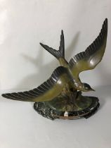 Continental art Deco mantel figure of a flying bird on marble base approximately 42 x 39 cm