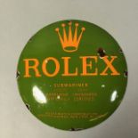 Enamel and metal round advertising sign for Rolex submariner watches approximately 30cm across