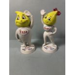 Pair of cast iron painted Esso figures Andy Slick and Abby Slick each approximately 24cm high