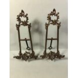 Pair of ornate table top picture easel stands in brass each approximately 41cm high