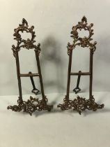Pair of ornate table top picture easel stands in brass each approximately 41cm high