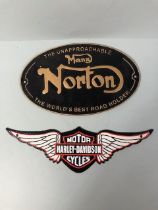 Two cast iron painted motorcycle signs, Harley davidson, Norton each approximately 38cm
