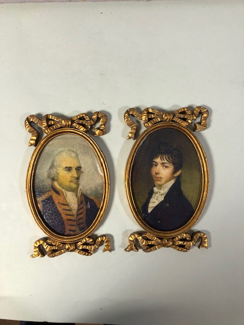 Pair of oval miniature portraits in ornate gilt frames approximately 14 x 22cm