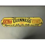 Enamel and metal advertising sign for Guinness approximately 57 x 13 cm