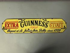 Enamel and metal advertising sign for Guinness approximately 57 x 13 cm