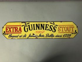 Enamel and metal advertising sign for Guinness approximately 57 x 13 cm