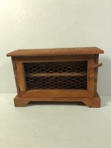 Wooden egg storage cupboard or box with wire mesh front approximately 38 x 12 x 25cm