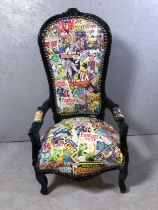 Antique style arm chair with a quirky twist, being upholstered in comic book design material
