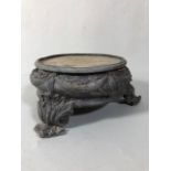 Decorative cast metal pot stand of Regency style, dark green patination, approximately 10cm high, to