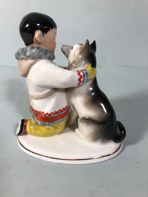 Soviet USSR Lomonosov figure of an Eskimo boy with fish, along with a boy and dog figure (damage - Image 9 of 15