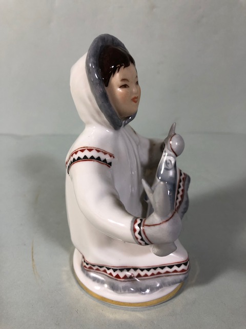 Soviet USSR Lomonosov figure of an Eskimo boy with fish, along with a boy and dog figure (damage - Image 2 of 15