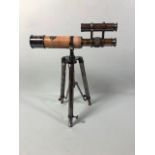 Brass and leather table top telescope on tripod stand approximately 32cm high