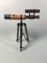 Brass and leather table top telescope on tripod stand approximately 32cm high