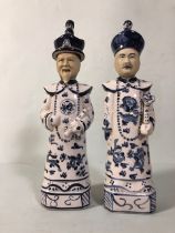 Pair of pottery Chinese style figures each approximately 33cm high