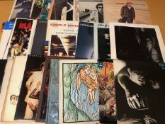 Vintage Vinyl Records, LP's by various artists to include The Mortal Coil, Moody Blues, Boz Scags,