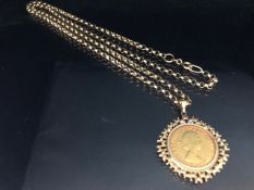 Gold sovereign QEII for 1950 in a 9ct gold pendant mount, suspended from a 9ct belcher chain