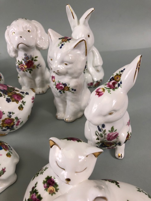 Collectable china figures of various animals each one decorated with flowers 14 in total - Image 5 of 15